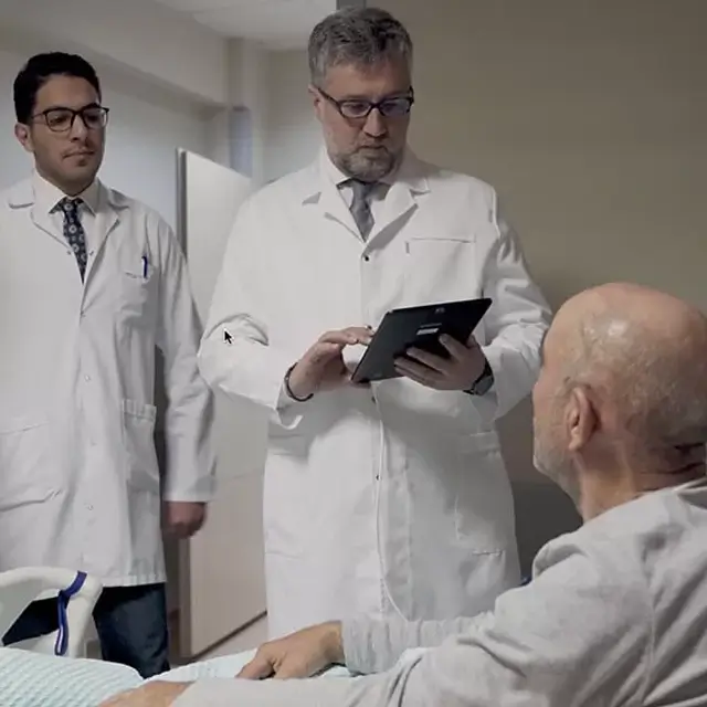 Post-operative bedside review with patient